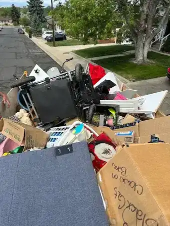 Full load of boxes, furniture and bikes viewed from the top of the trailer